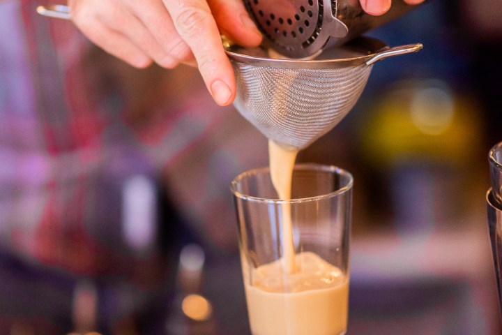 a person holding a cup