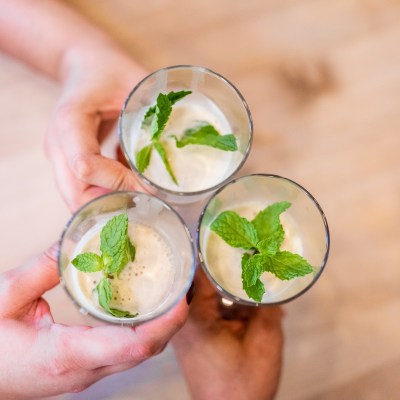 a person holding a bowl of food